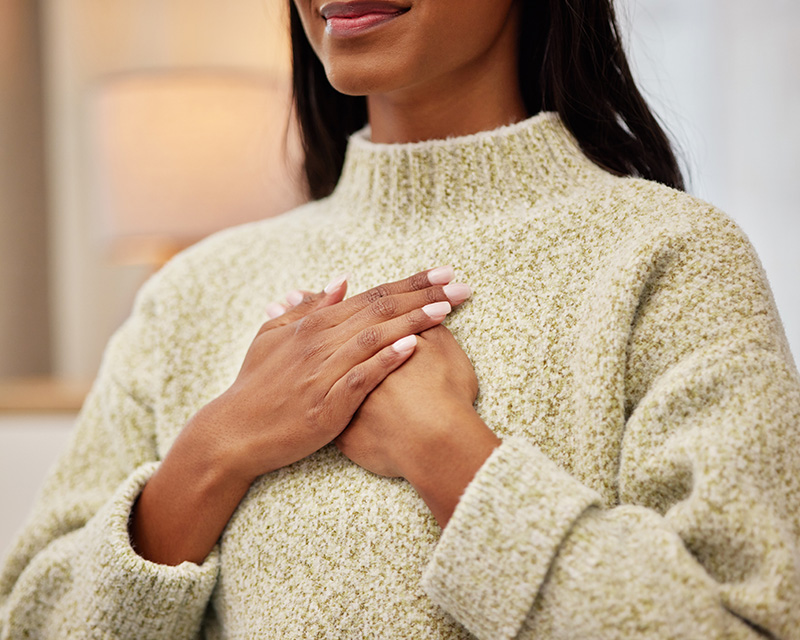 Woman practicing a mindfulness meditation during Dialectical Behavior Therapy (DBT) self compassion