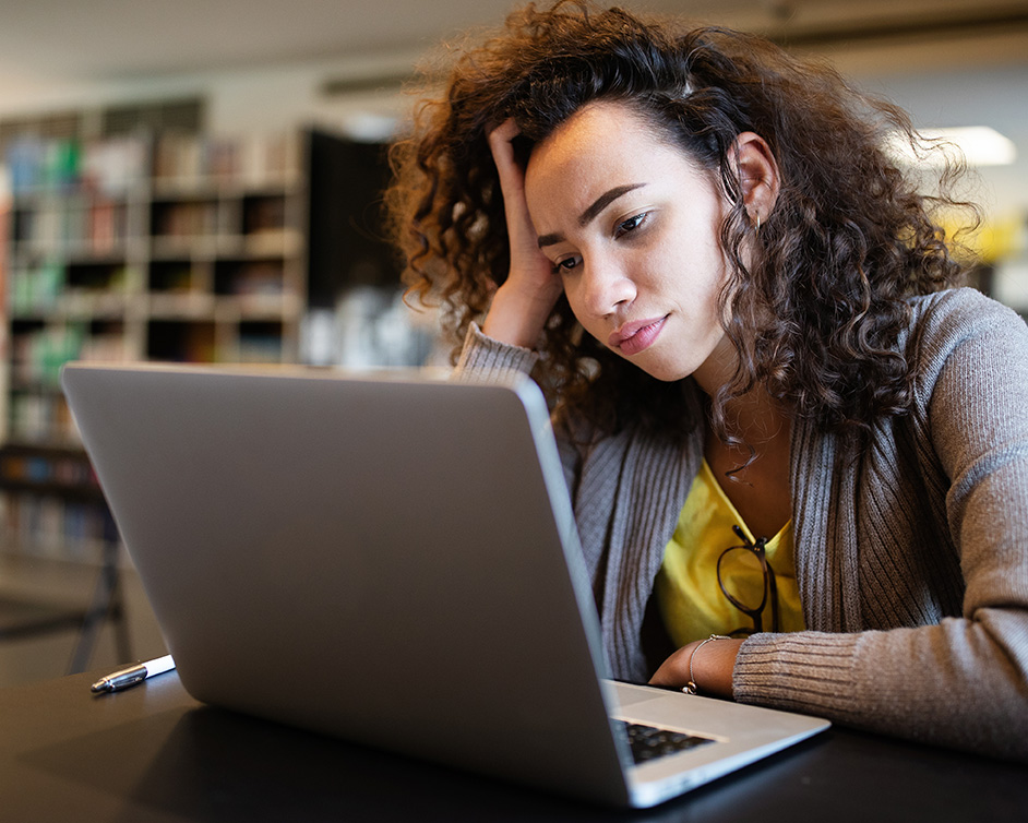 Young woman struggling to focus because of ADHD